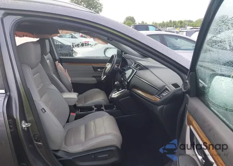 2018 Honda Cr-V Touring z USA, uszkodzony, nr VIN 7FARW2H90JE018638